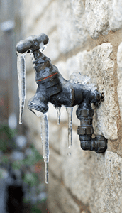 Water-Frozen-Around-Outdoor-Spigot-on-House-min