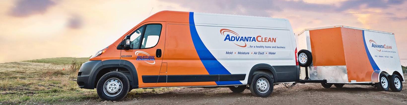 AdvantaClean branded van pulling a trailer