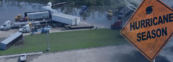 Commercial trucks damaged from a hurricane