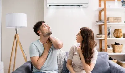 A couple sitting on a couch