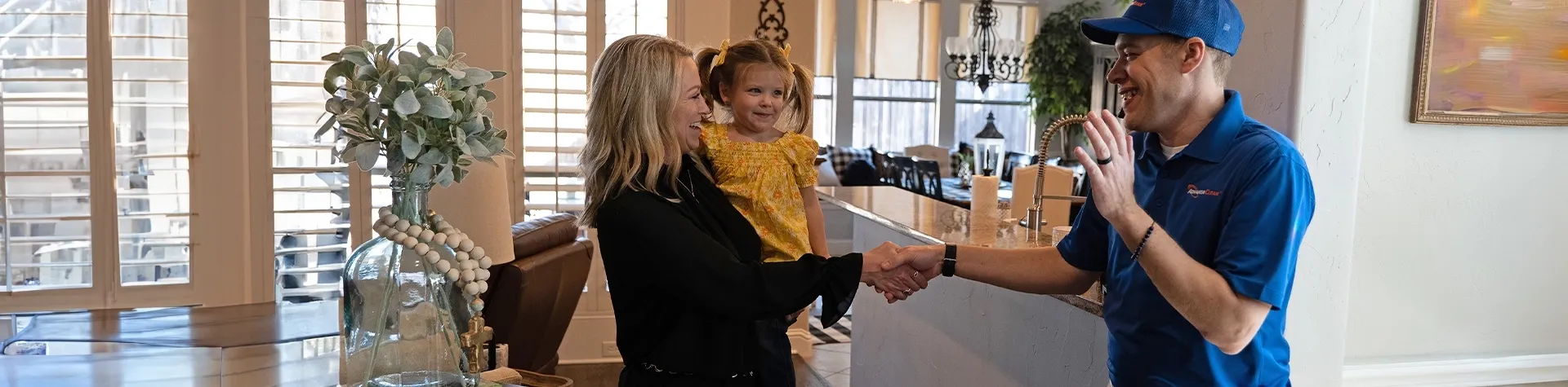 AdvantaClean of The Piedmont, Greensboro employee shaking hands with a customer