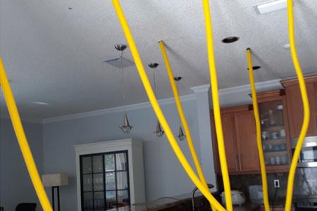 What to do when water comes through your ceiling?