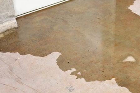 Why does your bathtub leak through the floor?