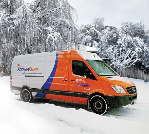 AdvantaClean truck in snow