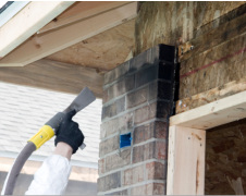 professional-removing-smoke-from-bricks
