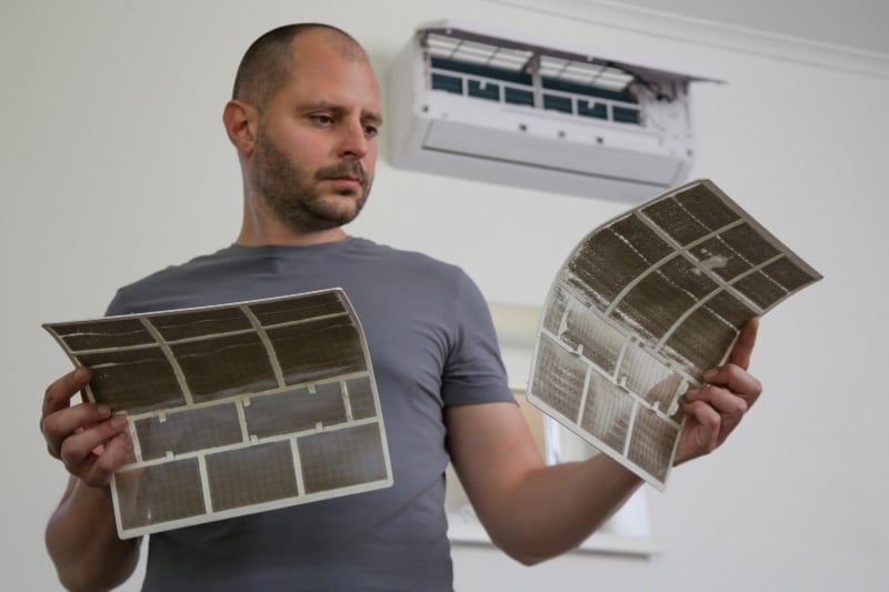 inspecting-moldy-vents.jpg